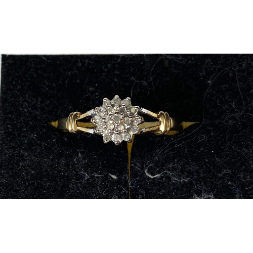 675A - A 9ct gold ring with diamond flower head, 19 stones, 1.8gm