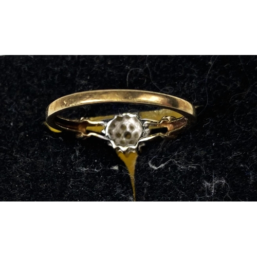 675A - A 9ct gold ring with diamond flower head, 19 stones, 1.8gm