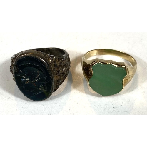 686 - An 18ct gold gentleman's signet ring with jade coloured shield shaped seal, 8.5gms; another with cra... 