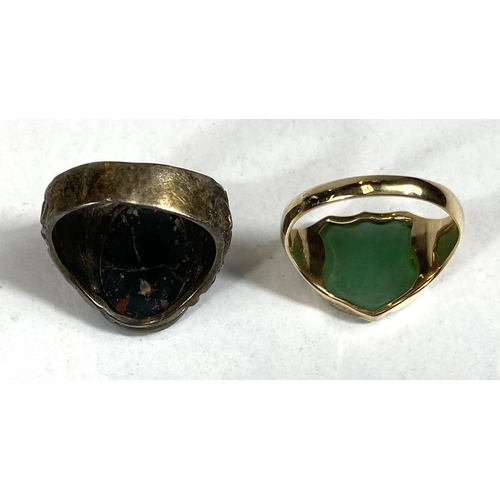 686 - An 18ct gold gentleman's signet ring with jade coloured shield shaped seal, 8.5gms; another with cra... 