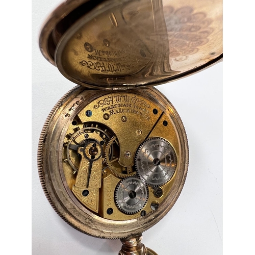 699 - A late night century gold plated Waltham open faced pocket watch with seconds of subsidiary dial