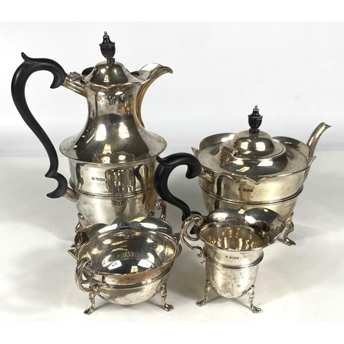 712 - A hallmarked silver 4 piece tea set of circular form with cut rims, on triple hoof feet, Sheffield 1... 