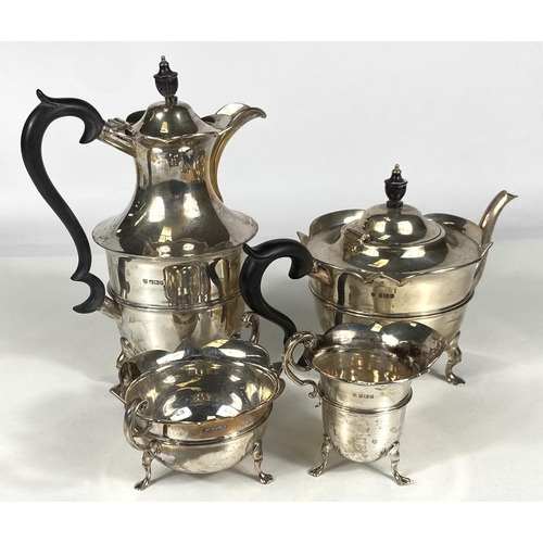 712 - A hallmarked silver 4 piece tea set of circular form with cut rims, on triple hoof feet, Sheffield 1... 