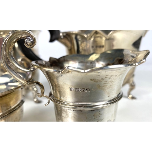 712 - A hallmarked silver 4 piece tea set of circular form with cut rims, on triple hoof feet, Sheffield 1... 