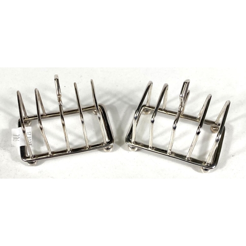 716 - A hallmarked silver pair of 4 division toast racks, Birmingham 1927, 2.5oz