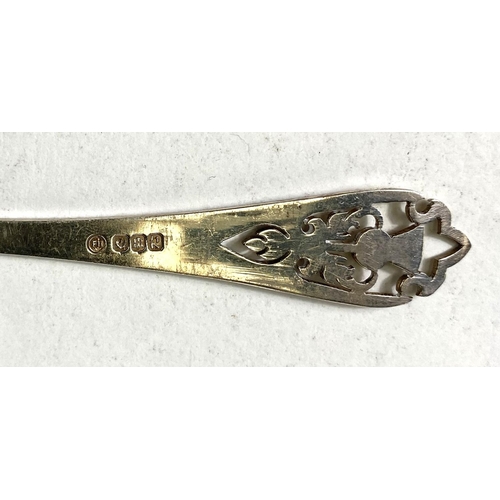 718 - A Scottish hallmarked silver pair of spoon and fork pickle servers with pierced thistle terminals; 3... 