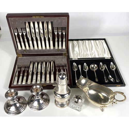 722 - A selection of silver plate:  dwarf candlesticks; sugar dredger; cased spoons and berry spoons;... 