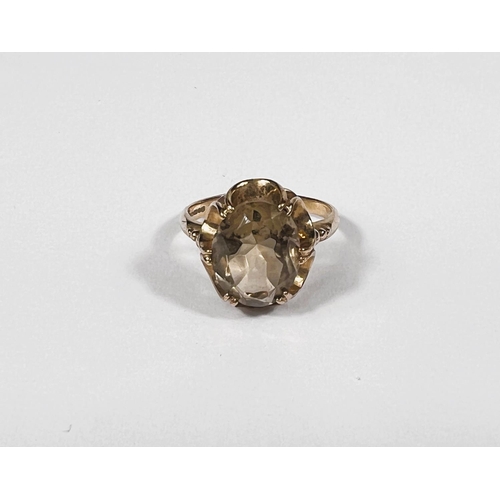 728 - A 9ct gold dress ring with smoky coloured stone, 3.1gm