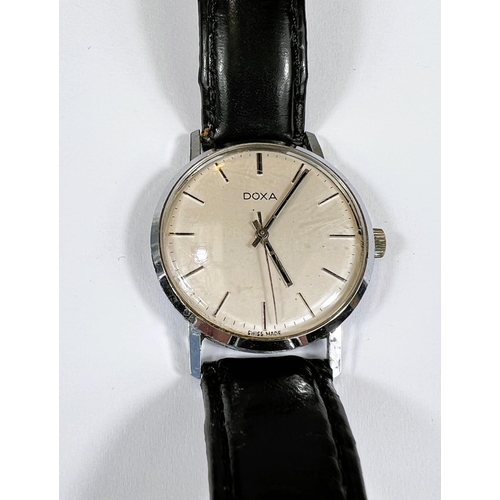 749 - A mid 20th century Doxa Swiss made gents wrist watch with stainless steel case baton markers and a l... 