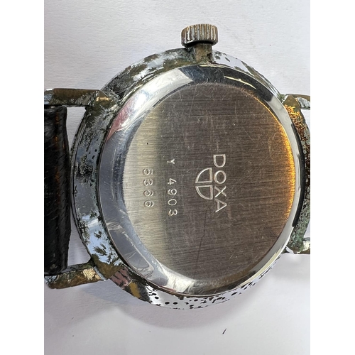 749 - A mid 20th century Doxa Swiss made gents wrist watch with stainless steel case baton markers and a l... 