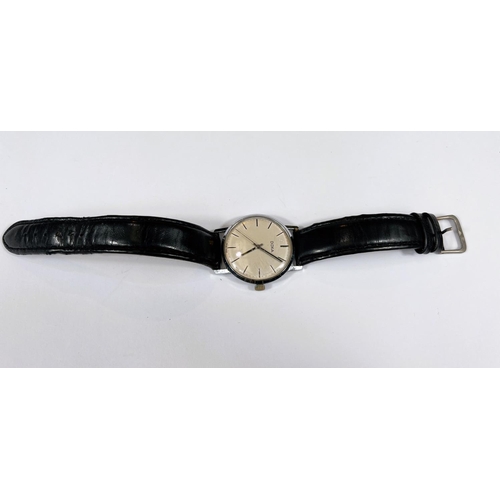 749 - A mid 20th century Doxa Swiss made gents wrist watch with stainless steel case baton markers and a l... 