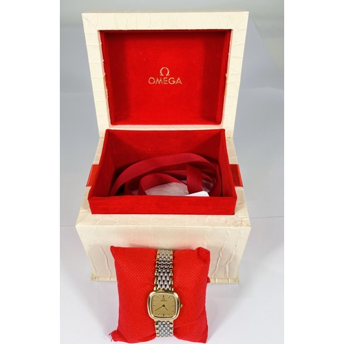 754 - A ladies Omega Isle de France originally boxed dress watch with gilt dial and case baton markers a b... 