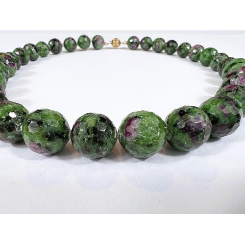 755 - A graduating multi facetted green and purple hardstone bead necklace