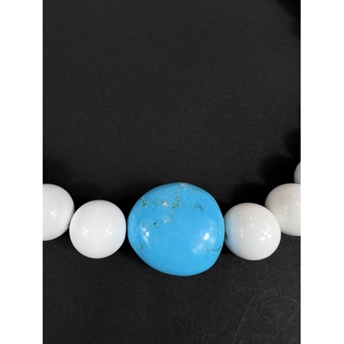 760 - A Pietre D'Amour Howlite bead necklace with white and blue stones, singed white metal clasp 