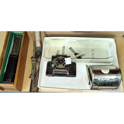 77 - A vintage Otis King calculator; a set of sovereign scales; an Ensign Midget camera; collectors items