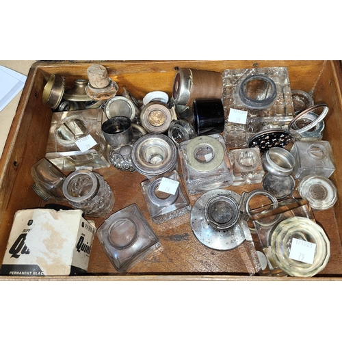 79 - A collection of glass and pottery inkwells; lustre drops; etc.