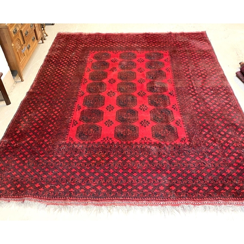 834 - An Afghan carpet 360 x 306 cm