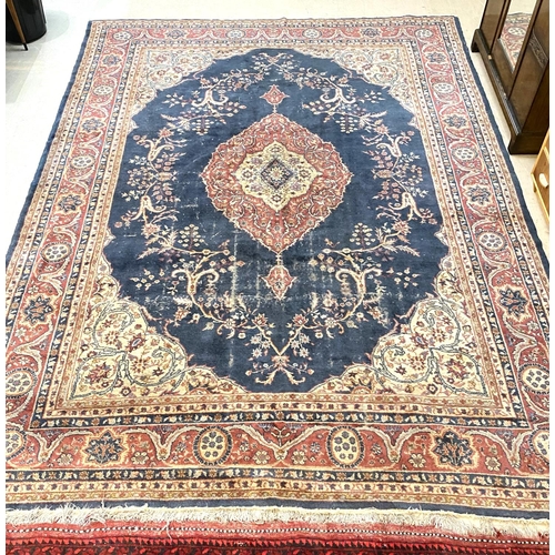 835 - An old Turkey carpet, worn, 380 x 290cm