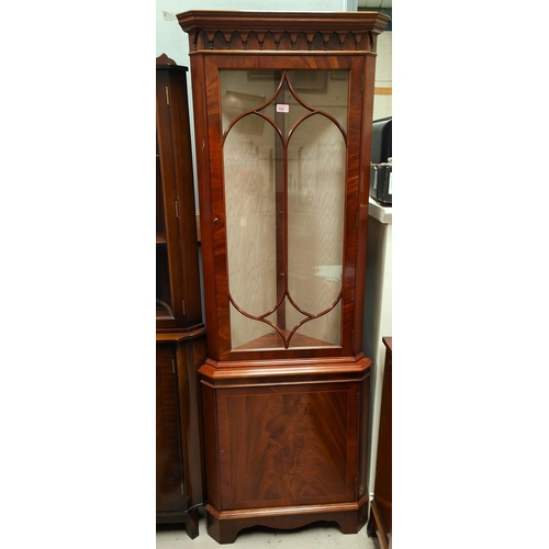 858 - A mahogany full height reproduction glazed corner cupboard with figured solid door below and glazed ... 