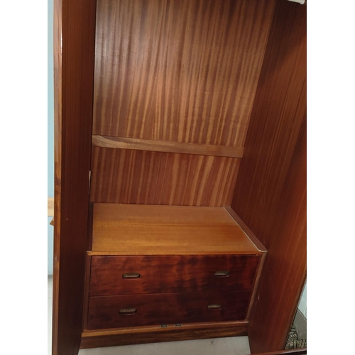 872 - A mid 20th century teak, two door wardrobe with interior drawers 92 x 170 x 57cm and a matching inte... 