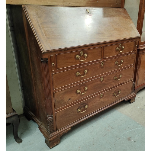 1008 - A mid Georgian mahogany fall front bureau with fall front and fitted interior, 3 long and 2 short gr... 