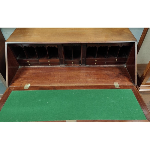 1008 - A mid Georgian mahogany fall front bureau with fall front and fitted interior, 3 long and 2 short gr... 