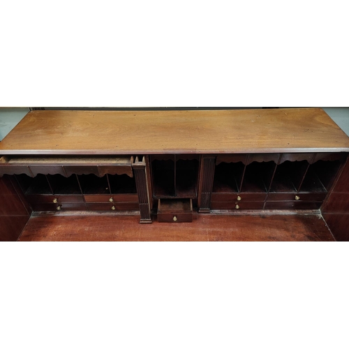 1008 - A mid Georgian mahogany fall front bureau with fall front and fitted interior, 3 long and 2 short gr... 