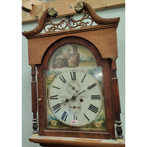 1009 - An early 19th century oak and mahogany longcase clock by Matthew Robson Belford, the hood with swan ... 