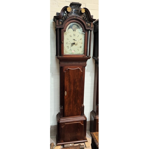 1010 - An 18th century figured mahogany longcase clock by Thomas Atkinson Ormskirk dated 1778, the hood wit... 