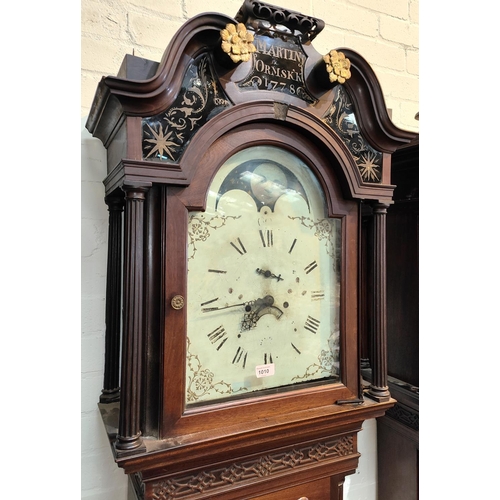 1010 - An 18th century figured mahogany longcase clock by Thomas Atkinson Ormskirk dated 1778, the hood wit... 