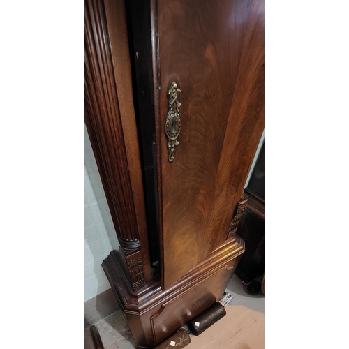 1011 - A late 18th century mahogany longcase clock by Wignall Ormskirk, the hood with blind swan neck pedim... 