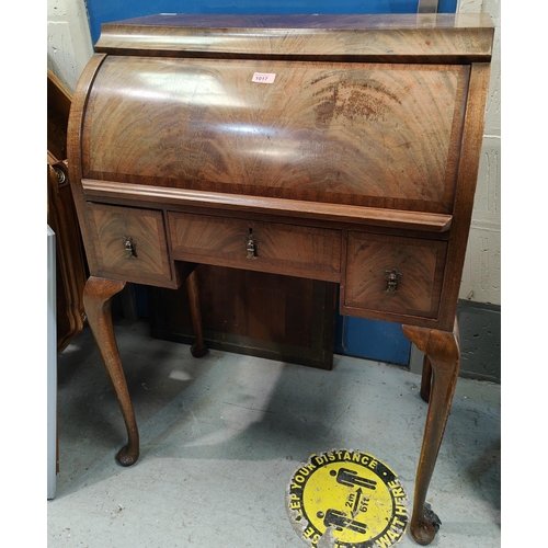 1017 - A mid 20th century figured mahogany cylinder bureau