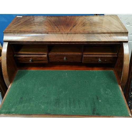 1017 - A mid 20th century figured mahogany cylinder bureau