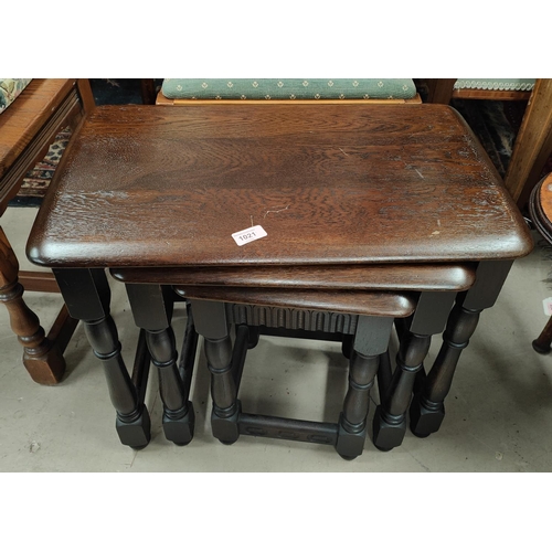 1021 - A nest of 3 Ercol oak occasional tables