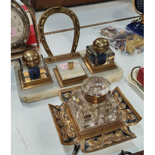 169 - A 19th century brass and cut glass inkwell and a similar Onyx desk inkwell set with 2 ink pots and C... 