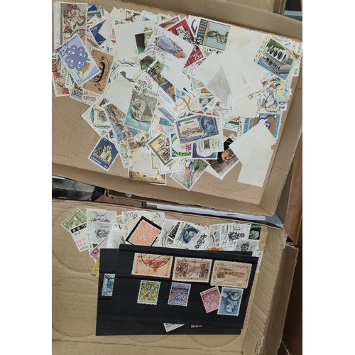 230 - Two small albums of stamps, a quantity of unsorted stamps on trays