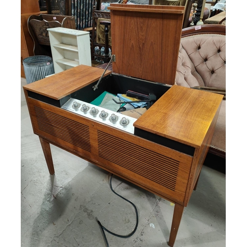 66 - A 1970's Ferguson stereo gramophone in teak case, with LP records