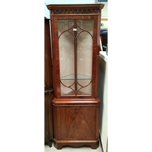 858 - A mahogany full height reproduction glazed corner cupboard with figured solid door below and glazed ... 