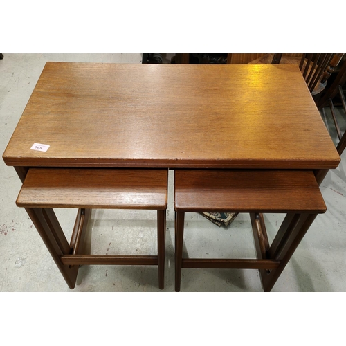 865 - A set of teak mid century tables with fold out top and two tables below and a vintage salter trolley