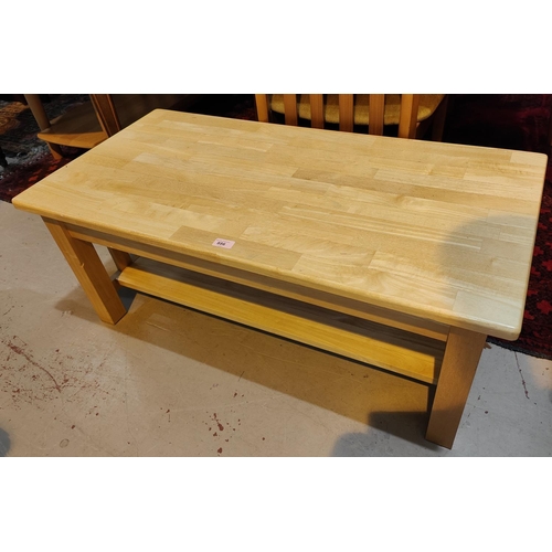 886 - A modern lightwood coffee table with rectangular top; 2 side tables