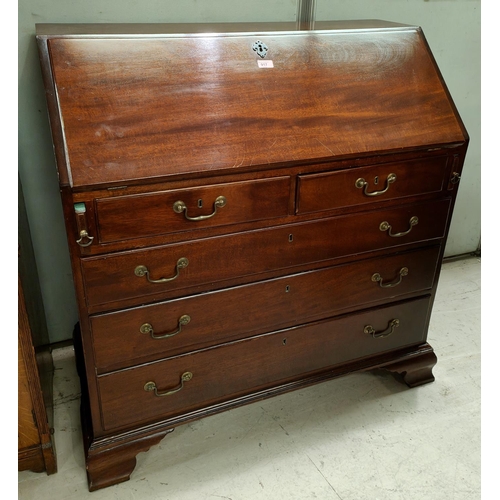 917 - A Georgian mahogany bureau with fall front, fitted interior, 3 long and 2 sort drawers with brass sw... 