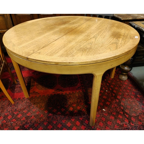 962 - A mid 20th century teak circular extending dining table, 120cm diameter, leaf 47cm and 3 teak dining... 