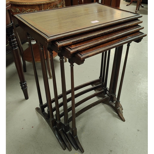 976 - A nest of 3 mahogany inlaid occasional tables