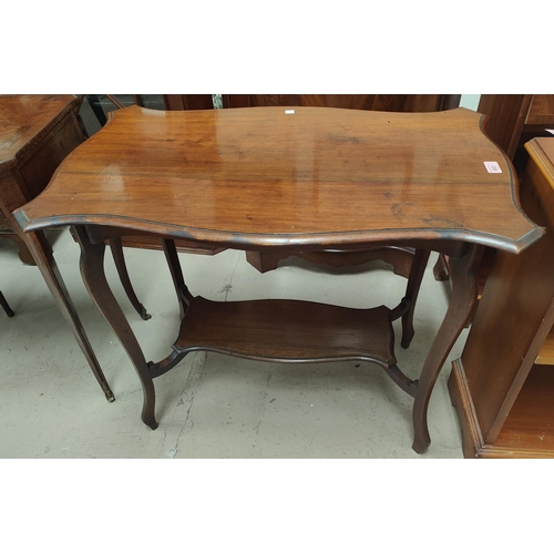 983 - A mahogany shaped two tier occasional table and another smaller