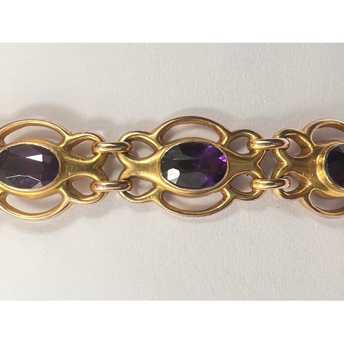 607 - An Edwardian 9ct gold amethyst set (12 stones) bracelet, 9.2gms. (approx. 18cm length)