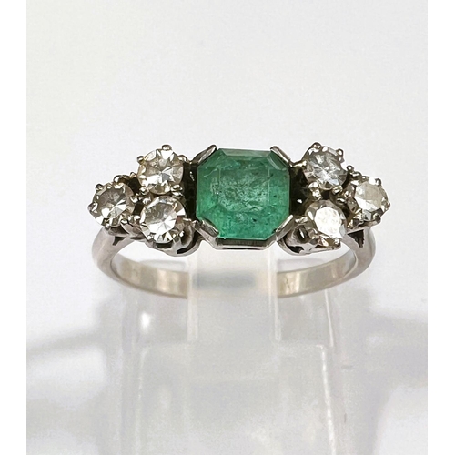 611 - A platinum stamped Art Deco dress ring, square cut emerald approximately 6mm x 6mm with bevelled and... 