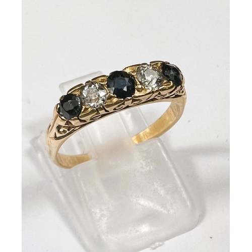 614 - An 18 carat hallmarked gold ring with 3 sapphires and 2 diamonds set alternately, size N/O, 4gm