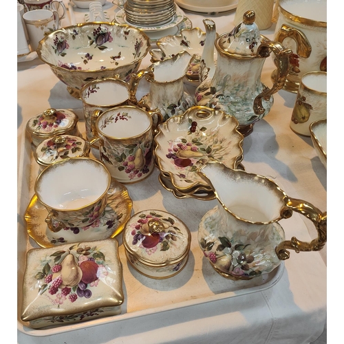 445 - A selection of Hammersley china and teaware decorated with fruit, some signed 