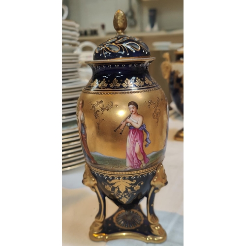 466 - A Dresden lidded vase in gilt and blue with hand painted female decoration 'Simon in Favour' (lid re... 