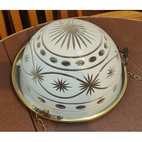 521A - A Victorian cut glass overlaid light bowl with white ground, star and other cut shapes diameter 29cm